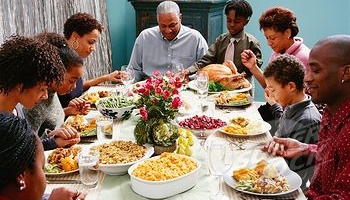 Large Family Praying Wide Pic
