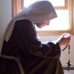 Praying and Kneeling Nun Sister Wide Pic
