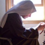 Praying and Kneeling Nun Sister Wide Pic 2
