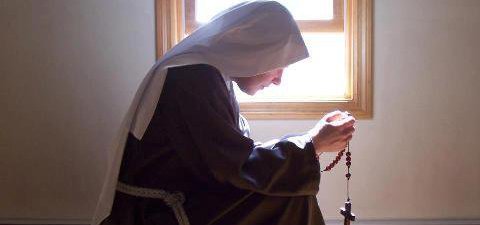 Praying and Kneeling Nun Sister Wide Pic 2