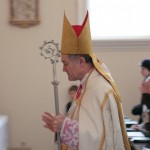 Bishop Fellay SSPX Crosier Praying Meditating Tall Pic