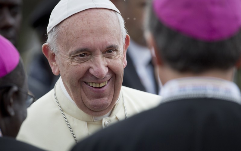 Pope Francis Smiling to Bishops and Cardinals Outdoors