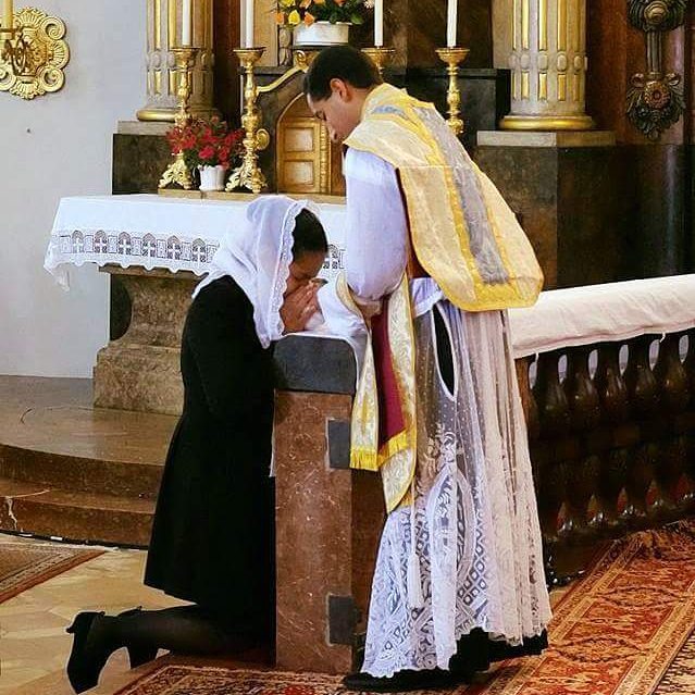 Mother and Priest Son Wrapped Consecrated Hands Picture of 2015