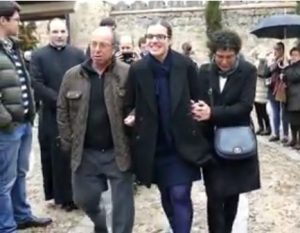 Joyous Young Woman Escorted by Friends and Family Enters Carmel
